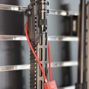 Lockable STEALTH M-LOK rifle mount securing a rifle