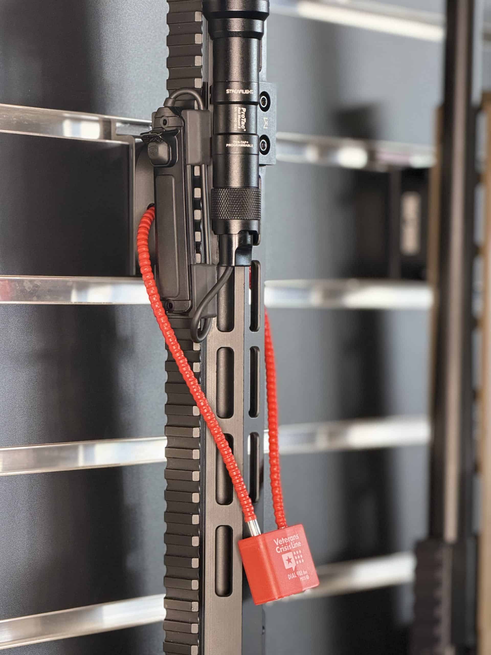 Lockable STEALTH M-LOK rifle mount securing a rifle